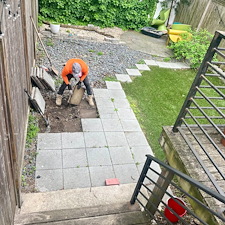 Red-Brick-Patio-Meet-Plush-Green-Turf-and-Cozy-Corner-Dcor-7150 0